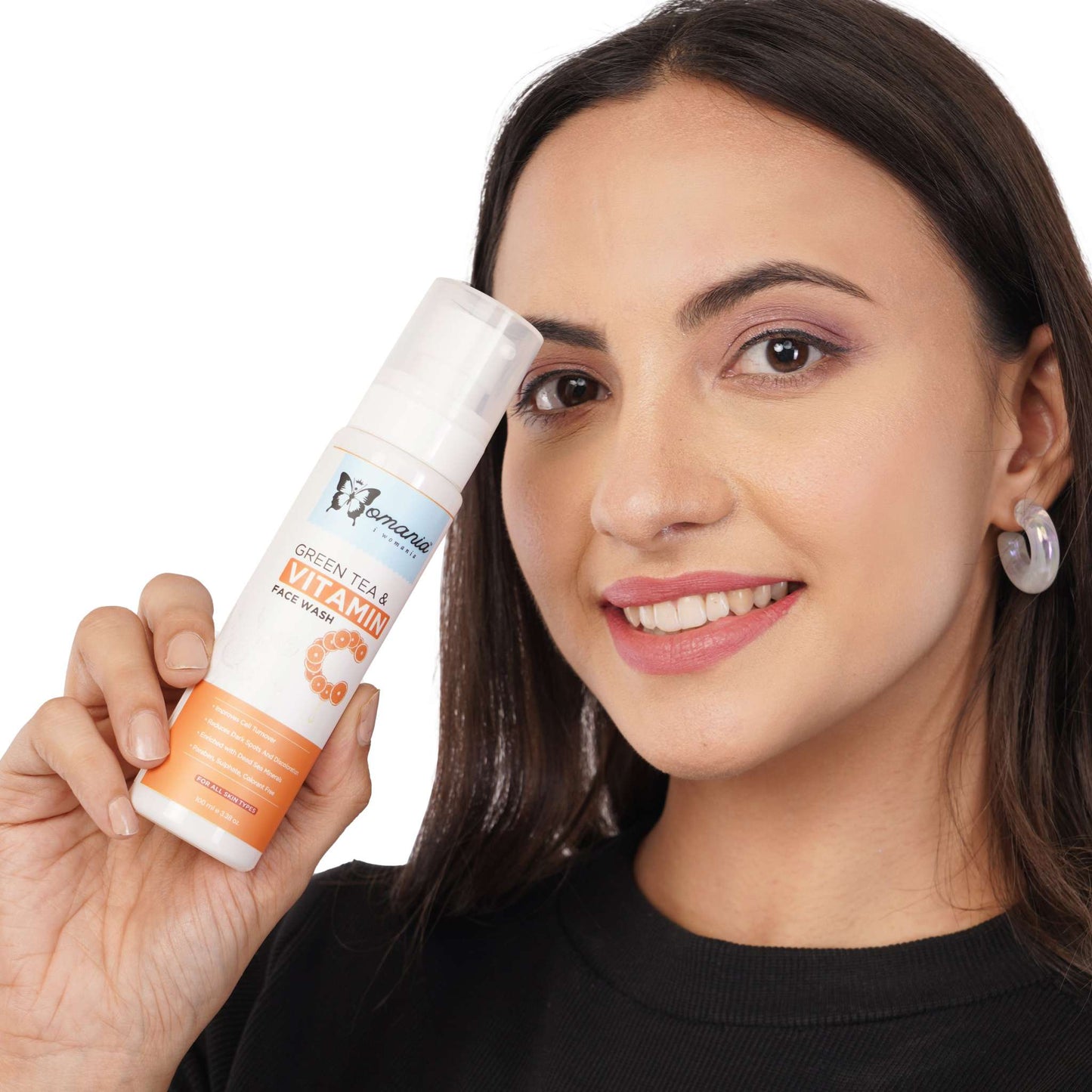 Face Wash with Green Tea & Vitamin C, 100ml bottle, held by a smiling person.