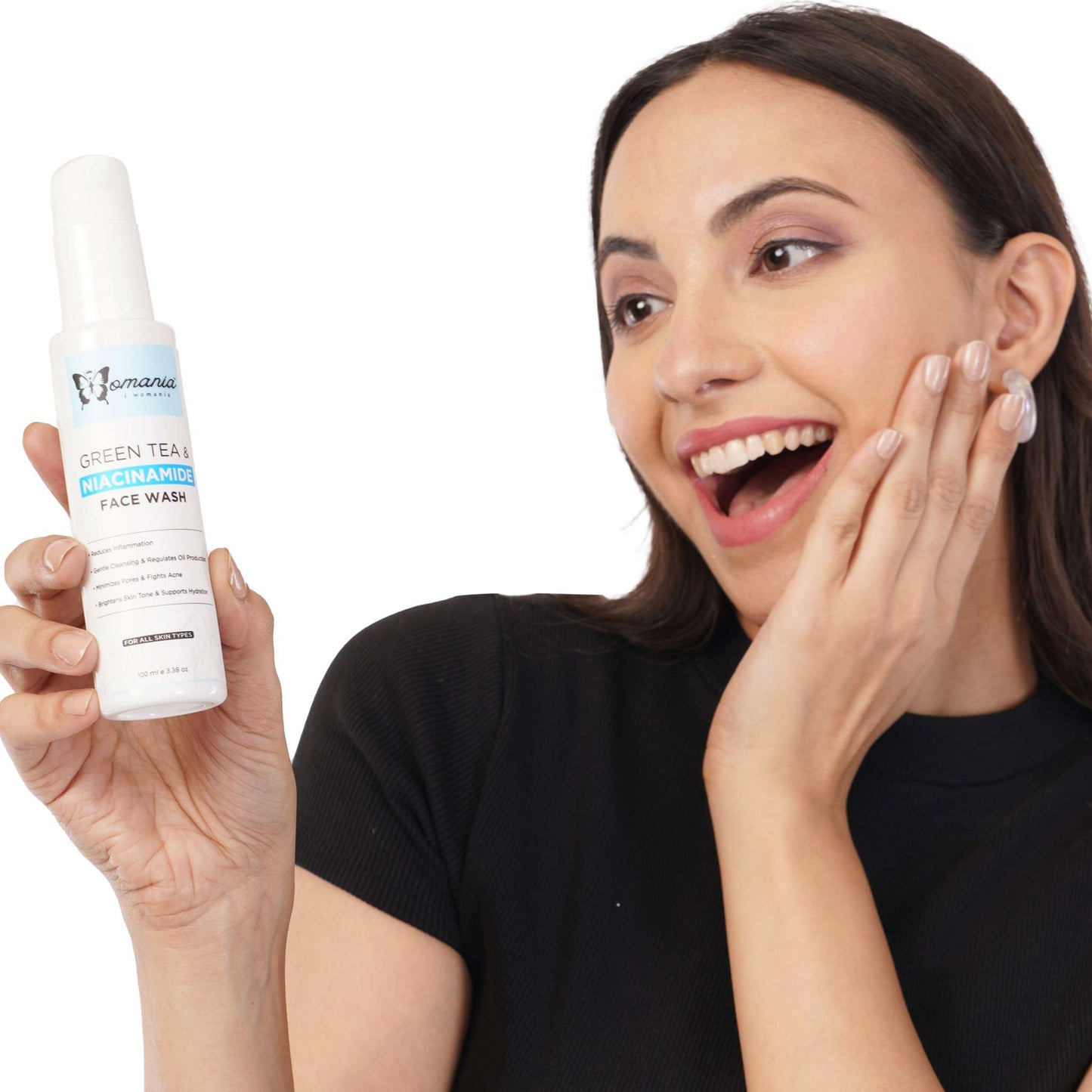 Woman holding a 100 ml bottle of Green Tea and Niacinamide Face Wash, suitable for all skin types.