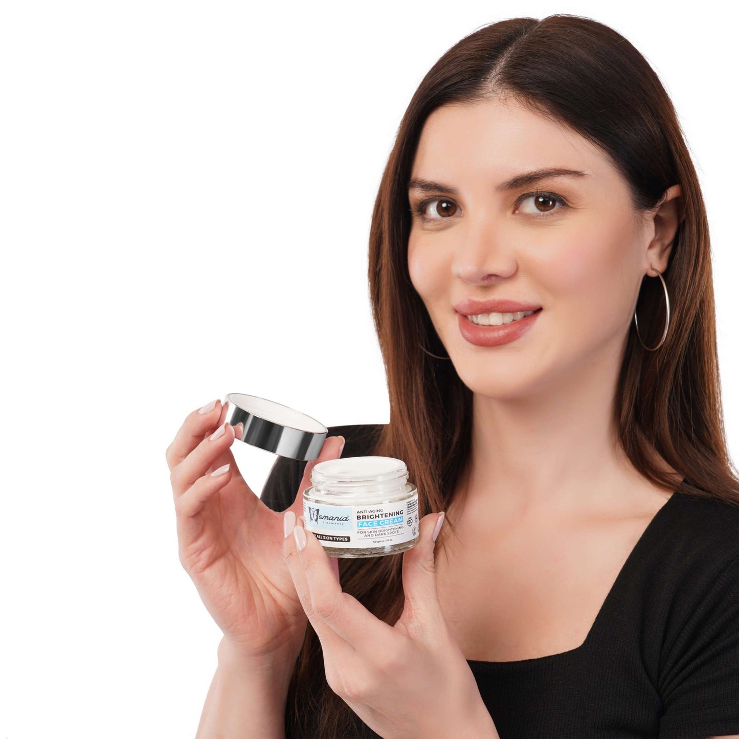 Brightening Cream (Anti-Aging) held by a woman, nourishing and hydrating for youthful complexion.