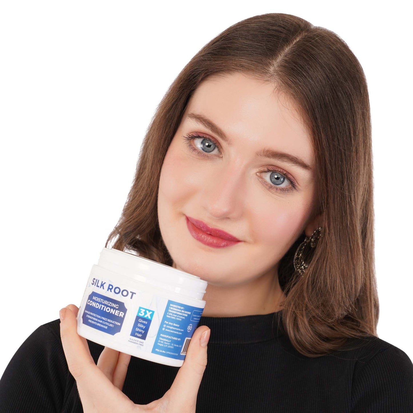 Silk Root Hair Conditioner✦200 gm being held by a woman with smooth hair, highlighting the product's benefits for nourishment and hydration.