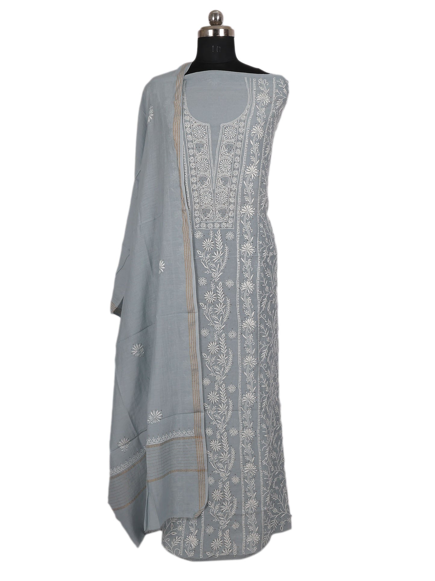 Lucknowi Chikankari unstitched suit showcased on a dress form, featuring intricate hand embroidery in soft grey.