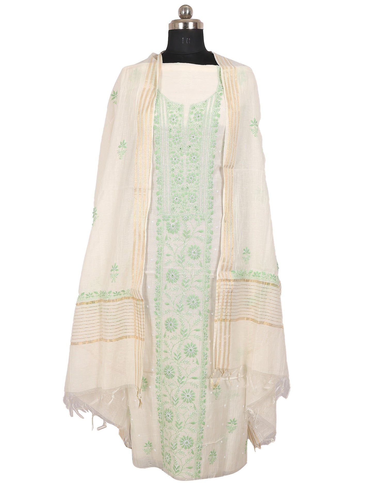 Lucknowi Chikankari unstitched suit displayed on mannequin, featuring off white fabric with green embroidery.