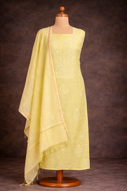 Lucknowi Chikankari unstitched suit lime – Mul Chanderi fabric with intricate embroidery and a matching dupatta.